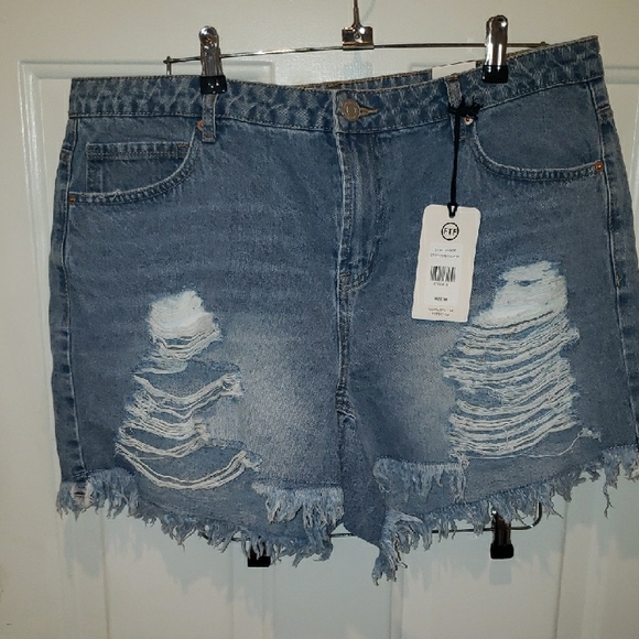 Fashion to Figure Light Blue Distressed Jean Shorts. - Picture 2 of 7